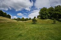 Grass green sloping English castle garden