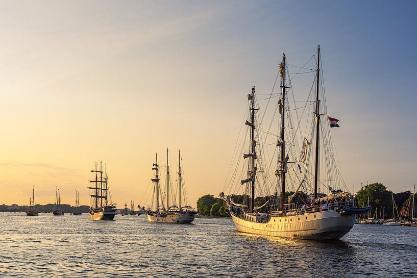 Sailing ships on the Warnow during the Hanse Sail in Rostock by Rico Ködder