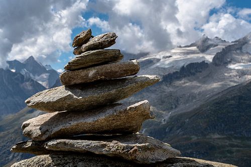 Stacked stones in the Swiss Alps by EJH Photography