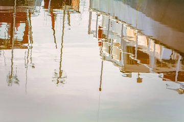 Boats are reflected in the water