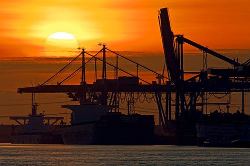 Sunset in the port of Rotterdam by Anton de Zeeuw