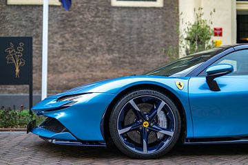 Ferrari SF90 sports car in light blue by Sjoerd van der Wal Photography