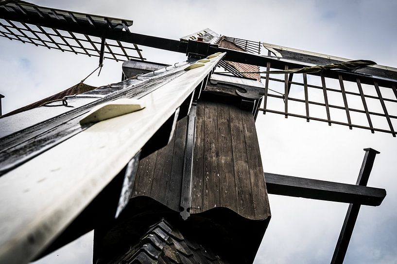 Detail of Dutch Windmill for making grain and flour with wind power energy by Fotografiecor .nl