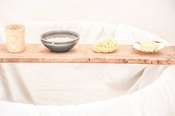 Shelf with soap and sponge and soft pastel shades by Frans Scherpenisse