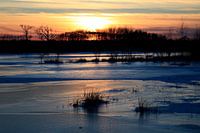 Réflexion sur le coucher du soleil