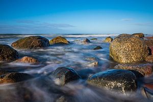 Stones on shore of the Baltic Sea van Rico Ködder