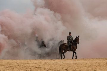 Horses through the smoke, on the Scheving beach by Erik van 't Hof