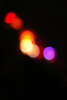Soft Lights Drifting Across the Dark