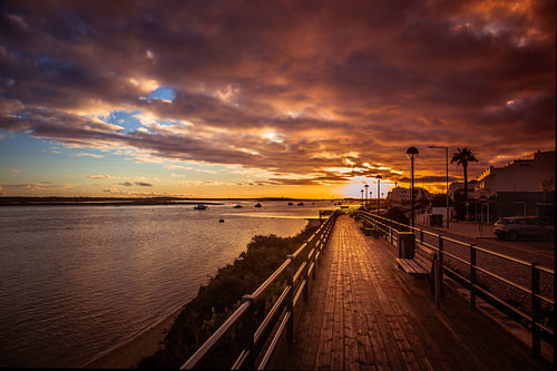 Sunset seen from the promenade in Cabanas de Tavira (Algarve, Portugal)