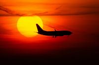 KLM Cityhopper is crossing the sun