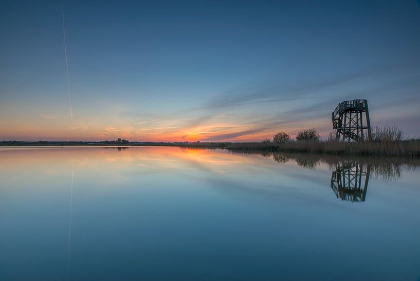 Watch tower at sunset by Marcel Kerdijk