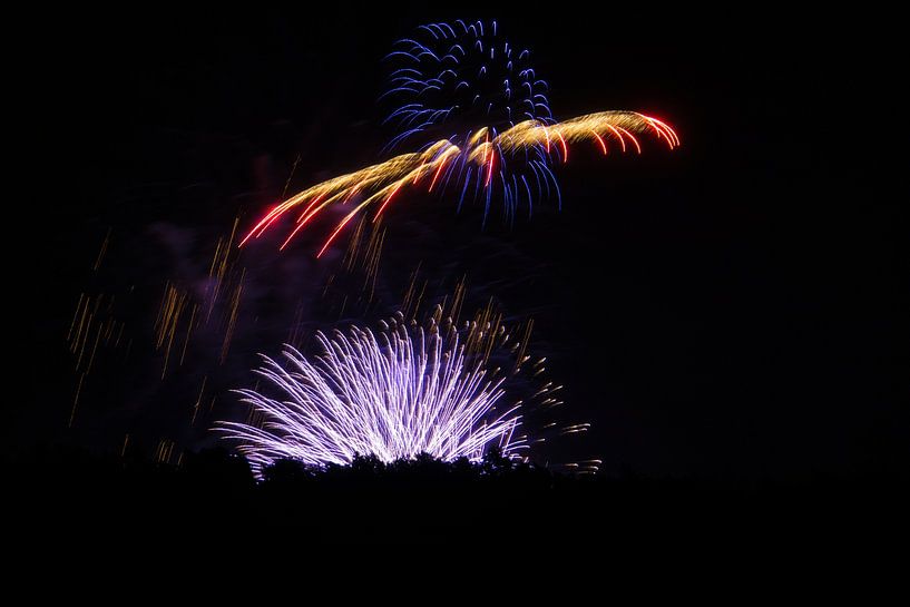 Three fireworks at once in blue and red by adventure-photos