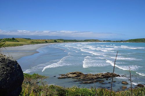 Inkomende golven bij Tauranga Bay