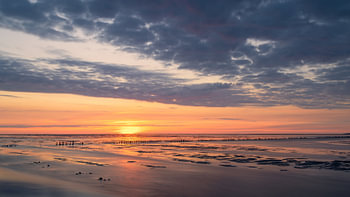 A sunset at the North Cape in the province of Groningen