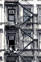 Man tussen brandtrappen Soho New York City 