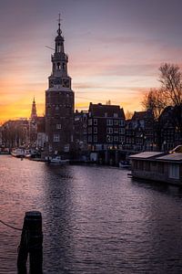 Fiery sunset above the Montelbaantoren in Amsterdam north-Holland standing