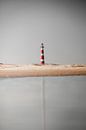 De vuurtoren van het mooie Ameland in reflectie van Graphx thumbnail