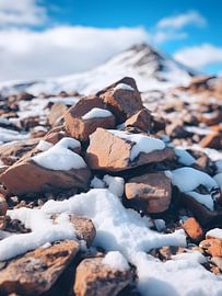 Snow-covered rocks against an alpine backdrop by drdigitaldesign