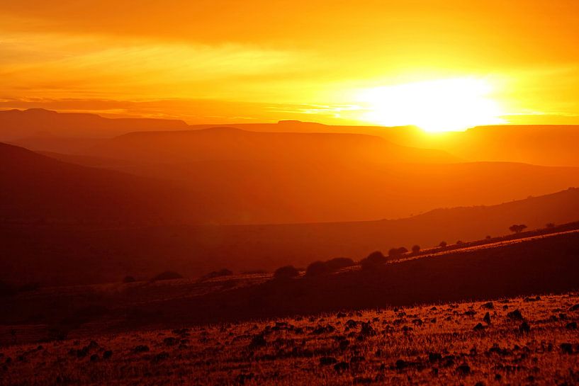 sunrise in the landscape of Namibia van W. Woyke
