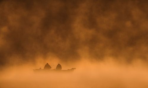 Twee vissers in de vroege ochtend