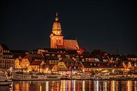 Waren St. Mary's Church and harbor at night