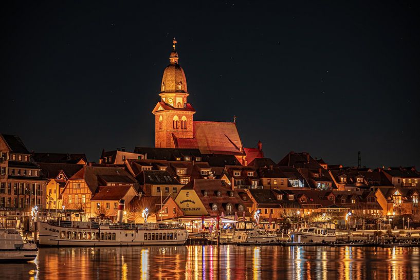 Waren St. Mary's Church and harbor at night by Patrick Schwarzbach