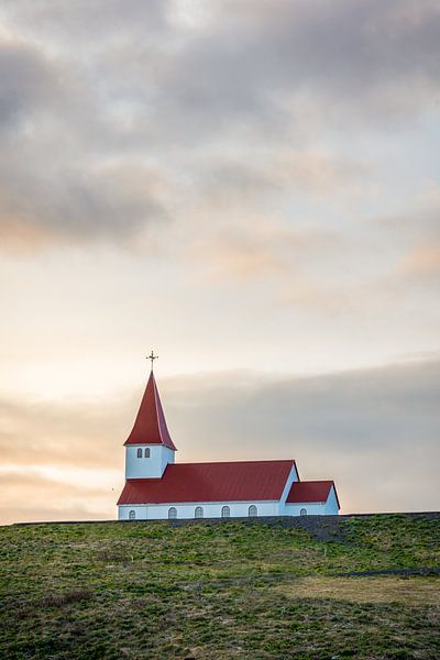 Church on the mountain during sunset by Maarten Borsje