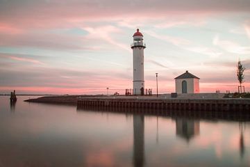 Lighthouse at sunset by Miranda van Hulst