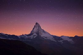 Stars above the Matterhorn in the Swiss Alps by Menno Boermans