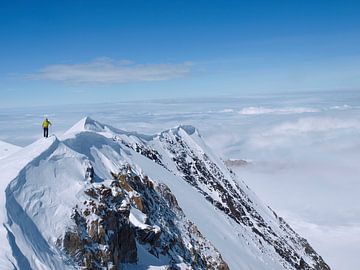 Alpinist on snow ridge of Denali by Menno Boermans