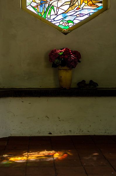 Stained glass lighting in an old chapel in the Netherlands by Hein Fleuren