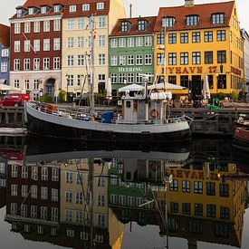 Nyhavn, Copenhagen at sunrise | Travel photography | Reflections in the water by Kelsey van den Bosch