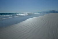 Verlaten strand bij Mughsayl (Oman)