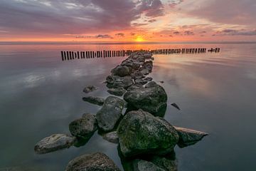 Sunrise at the IJsselmeer lake at Enkhuizen in The Netherlands  by Ardi Mulder