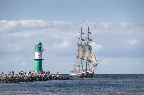 Sailing ship at the lighthouse