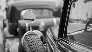 Old classic car with chrome mirror, black and white photograph by Animaflora PicsStock