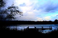 Jetty below a clearing sky