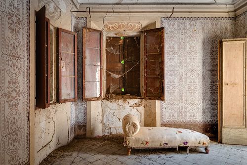 An antique bedroom with sofa by Perry Wiertz