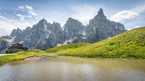 Baita Segantini Hut and Pale di San Martino Peaks at Passo Rolle