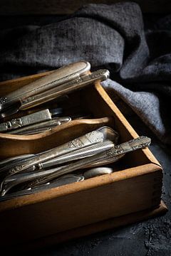 Antique silver cutlery in vintage cutlery tray by Saskia Schepers