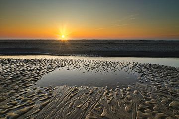 Sea water at sunset by peterheinspictures