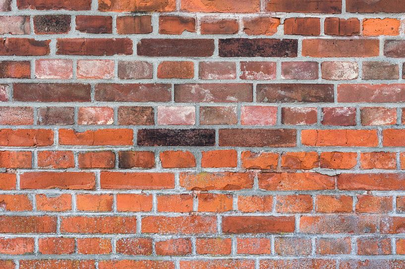 Gros plan de la texture d'un mur de briques rouges par Alex Winter