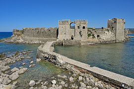 Methoni Castle, with a stone bridge spanning the sea by Tomherkules