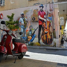 Street musicians and a red Vespa scooter, Athens by My Footprints