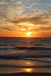 Sonnenuntergang mit Spiegelung bei Westerland