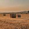 Balle de foin au coucher du soleil en Toscane sur Erik van 't Hof
