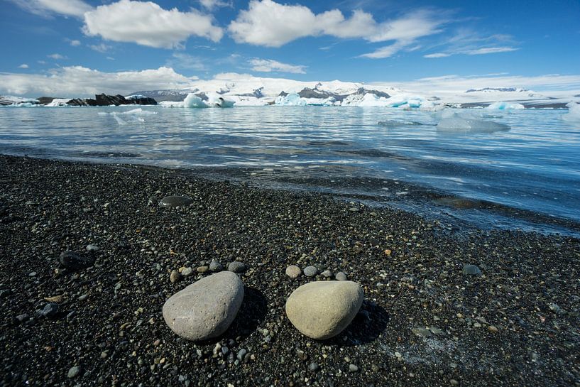 Iceland - Stone feet at black sand beach of glacial lake by adventure-photos