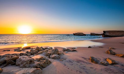 Zonsondergang op het strand