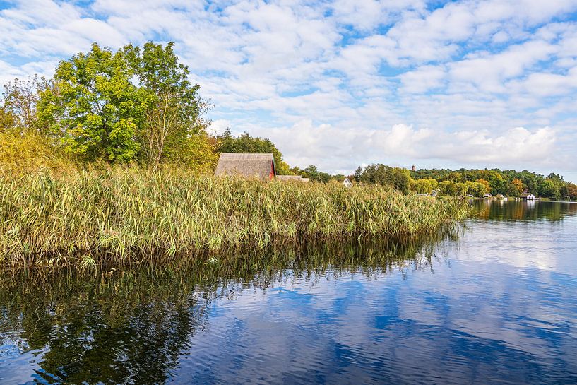 Boathouses and reeds on Krakow Lake in the town of Krakow on the S by Rico Ködder