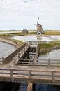 Molen Het Noorden op Texel (staande versie) van Cor de Hamer thumbnail
